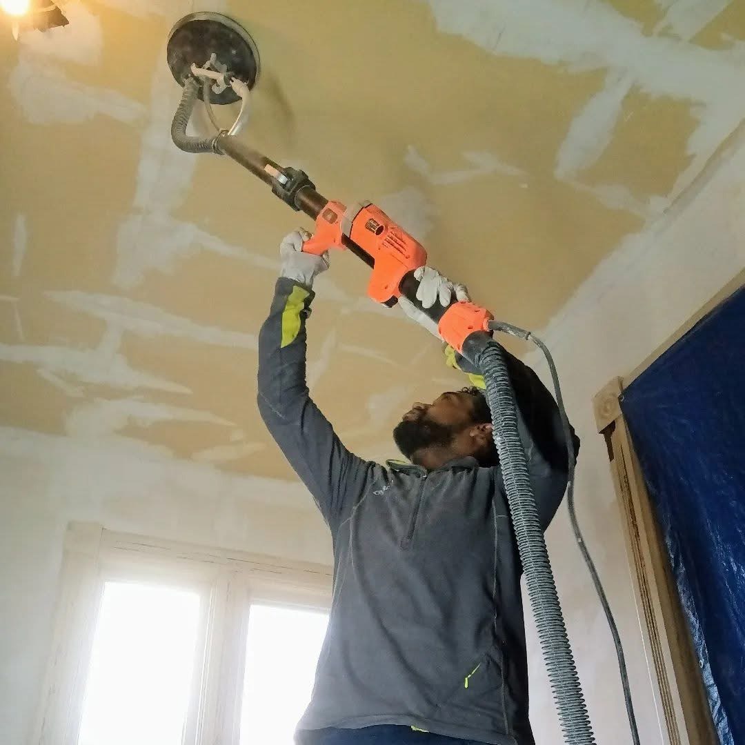 Gregg Swan completing ceiling repair work